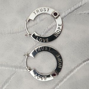 Elle "Trust Love Hope" Sterling Silver hoop earrings with ruby accent.